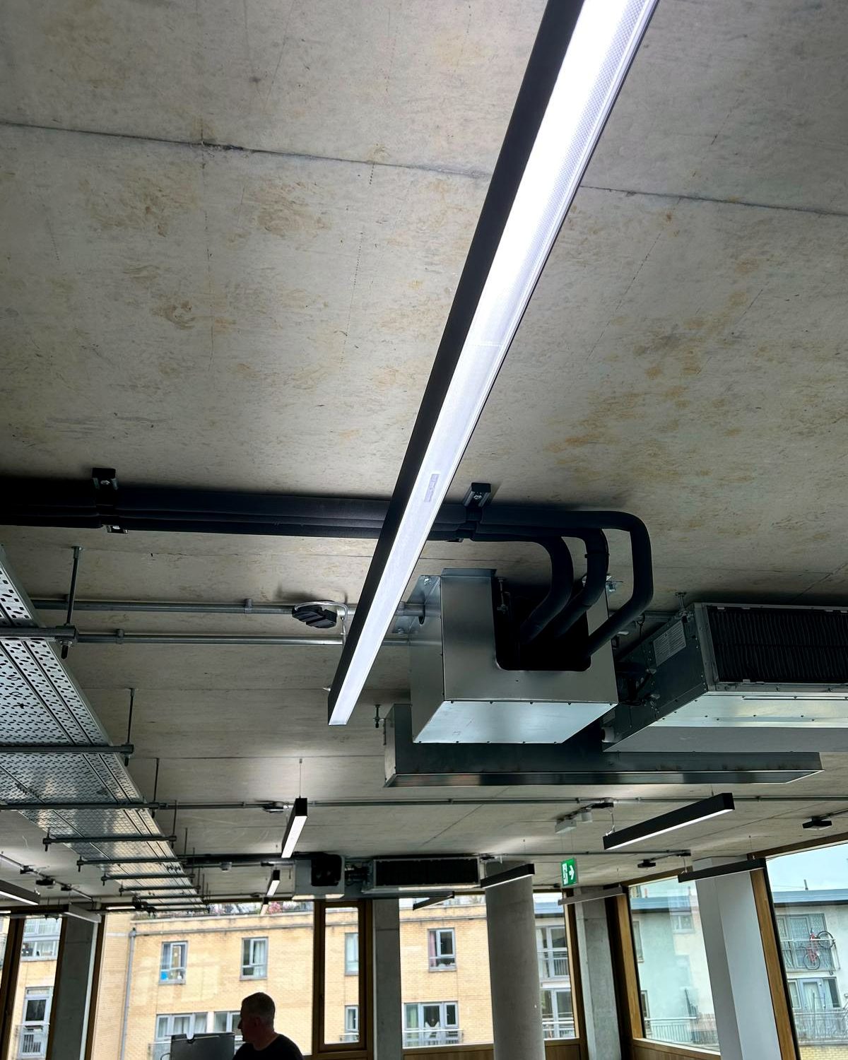 Gym ductwork installation for air conditioning system