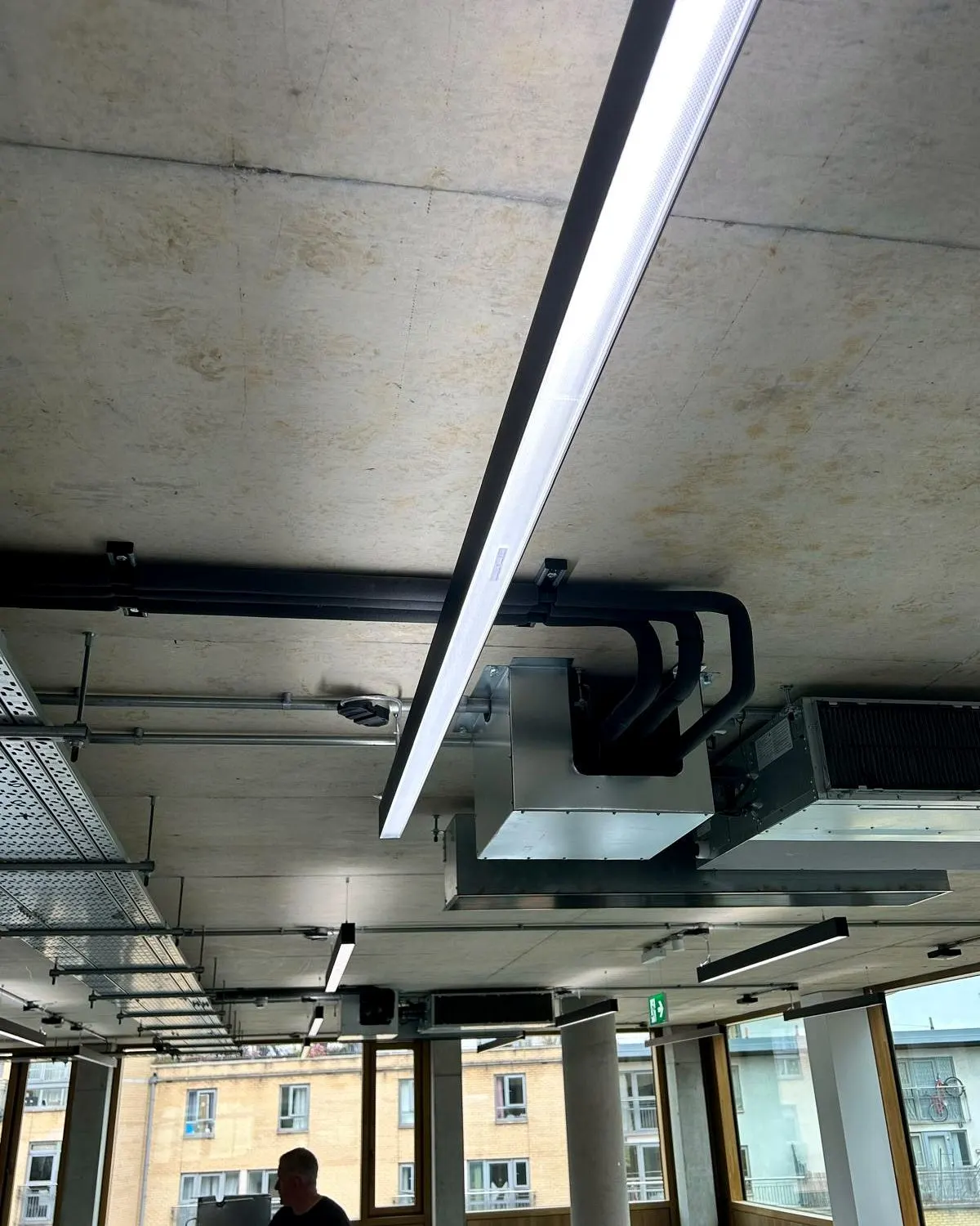 Gym ductwork installation for air conditioning system