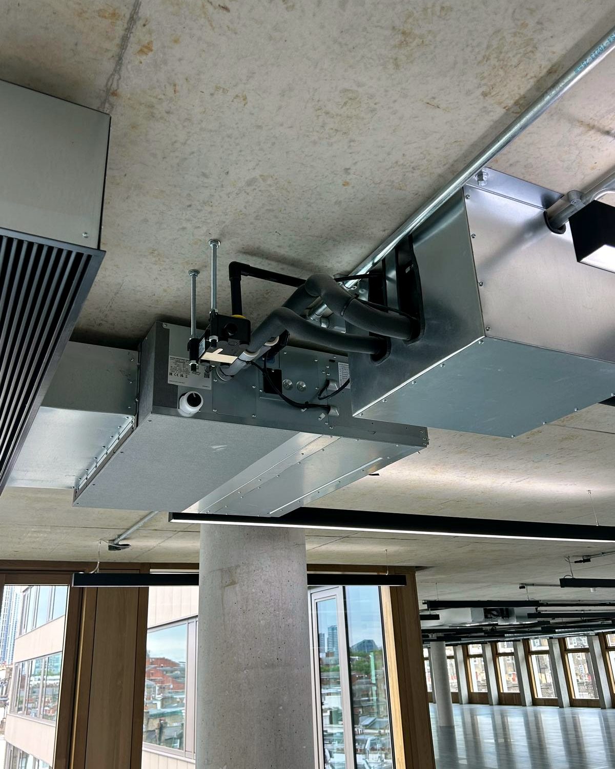 Air conditioning plant detail showing pipework and connections